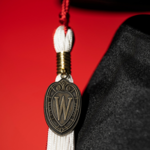UW graduate cap and UW crest tassel